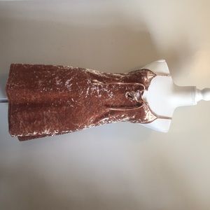 Short cute dress with a very cute front to it.